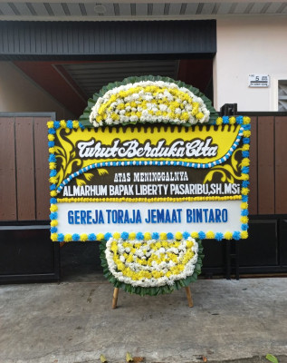 Papan Bunga Duka di Tirtonirmolo