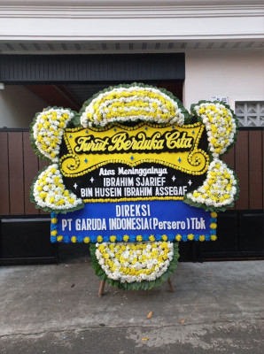 Papan Bunga Duka di Tirtonirmolo